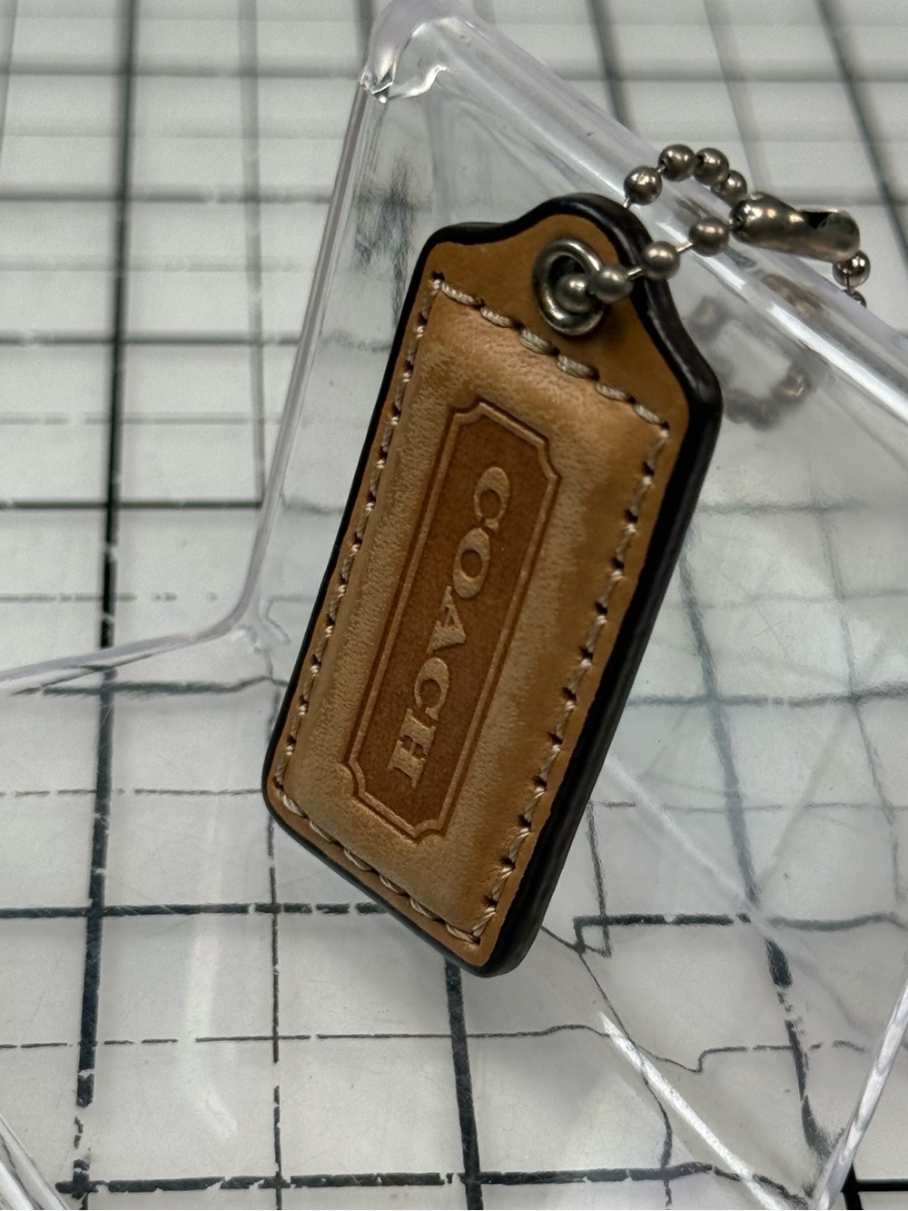 Coach two small Tan Leather Hang Tag Keychain Set. 2 by 1 inches. One with wear - Picture 5 of 5